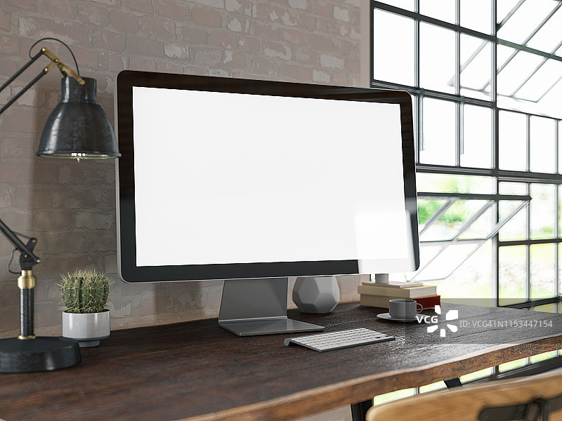 带空白电脑屏幕的工作区图片素材