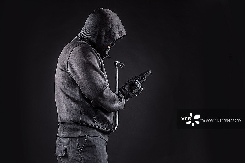 戴帽子的蒙面罪犯图片素材