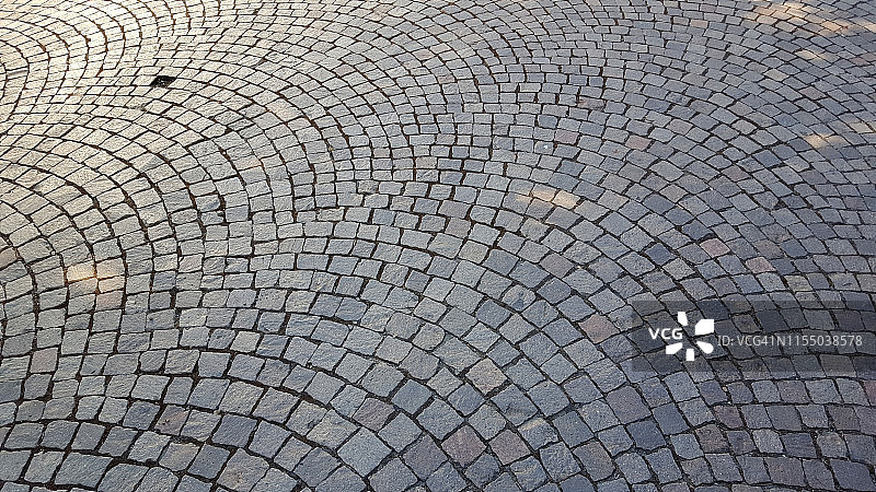 缺失一块石砖的鹅卵石地砖图片素材