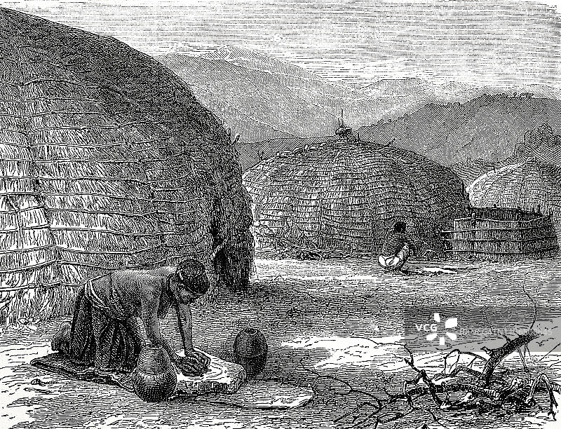 在户外烤面包的祖鲁族女人图片素材