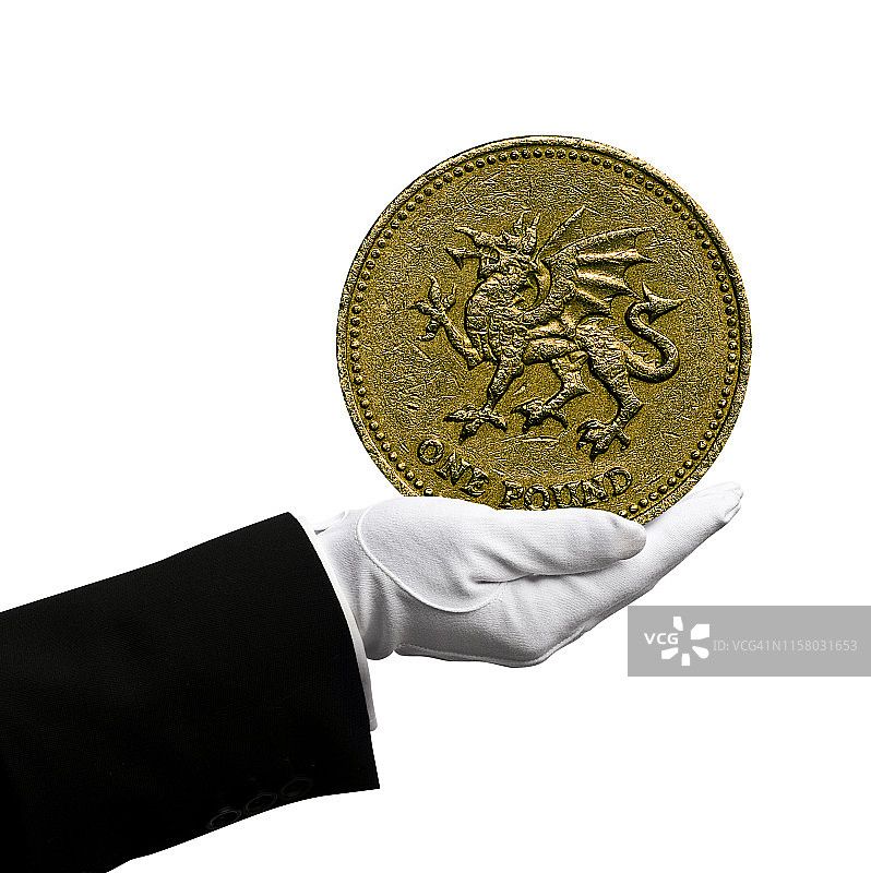 管家拿着英镑硬币图片素材