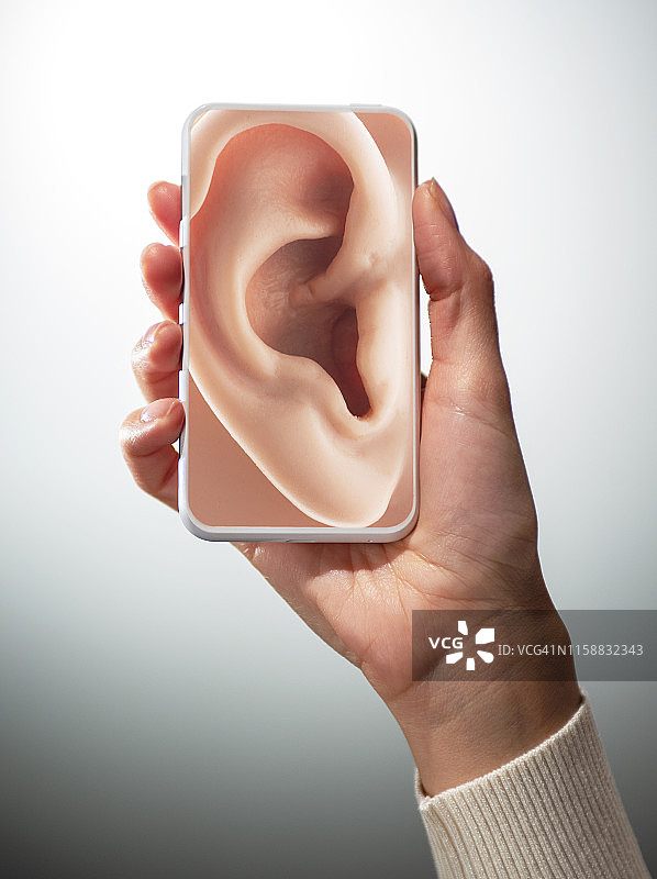 智能手机上的耳朵图片素材