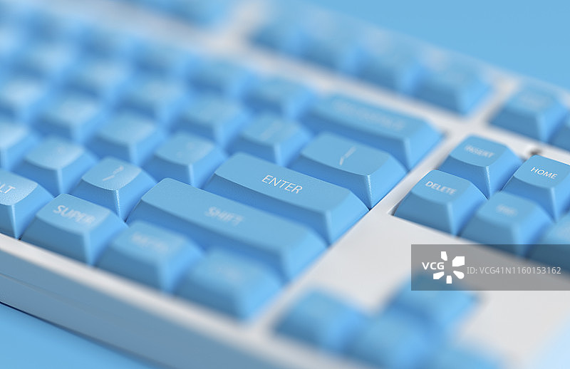 蓝色机械键盘上的回车键图片素材