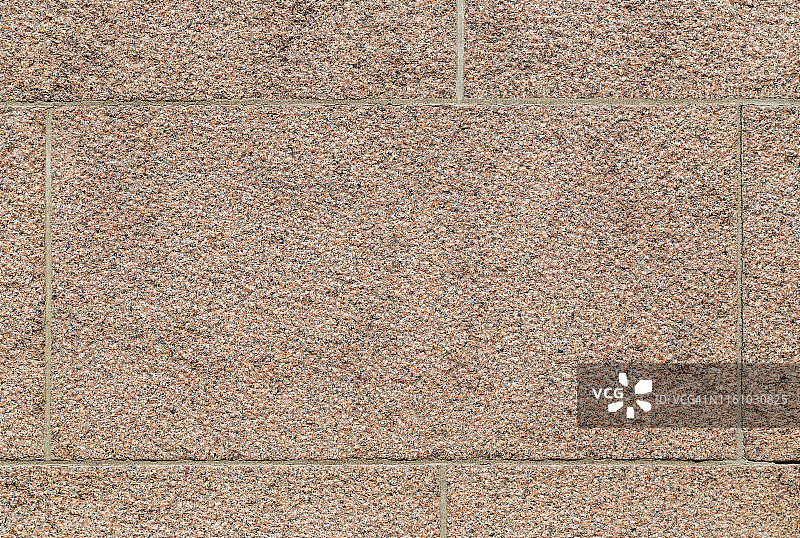 特写：红色花岗岩砌块墙背景图片素材