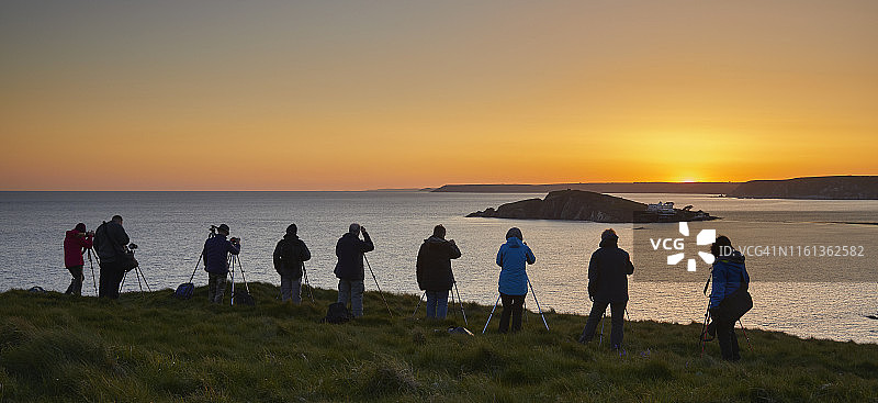 摄影师们拍摄日落美景图片素材
