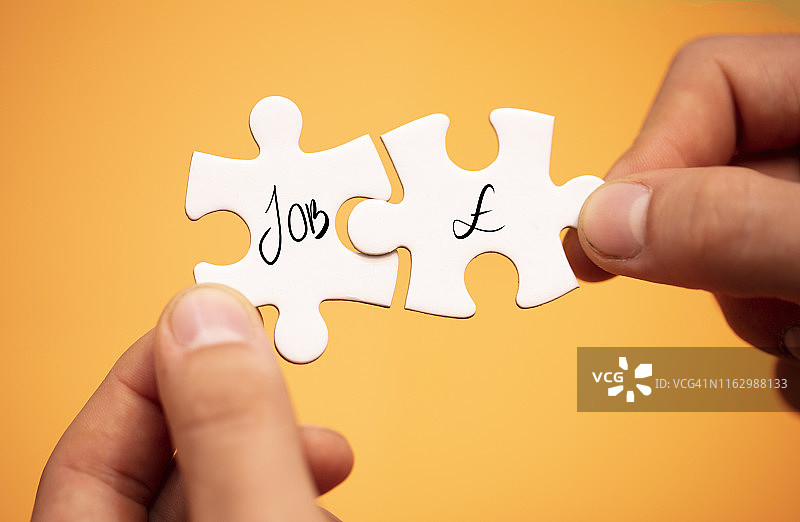 以货币为背景的拼图图片素材