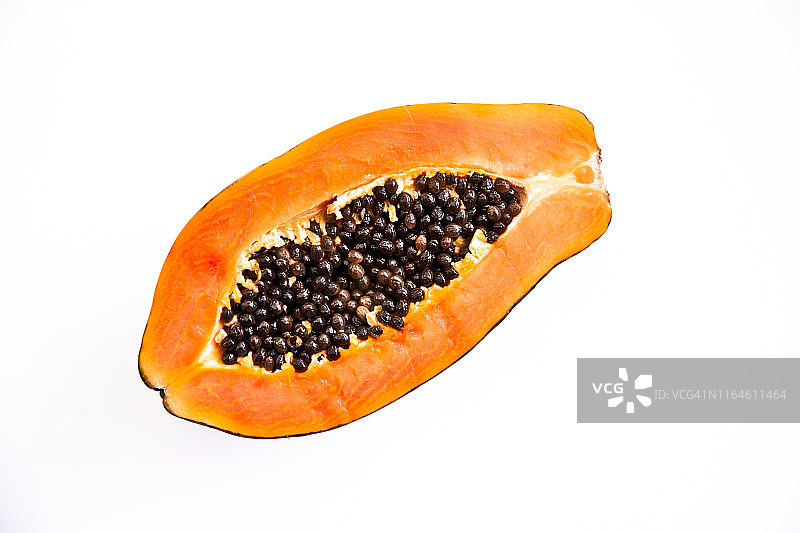 对半切开的红木瓜图片素材