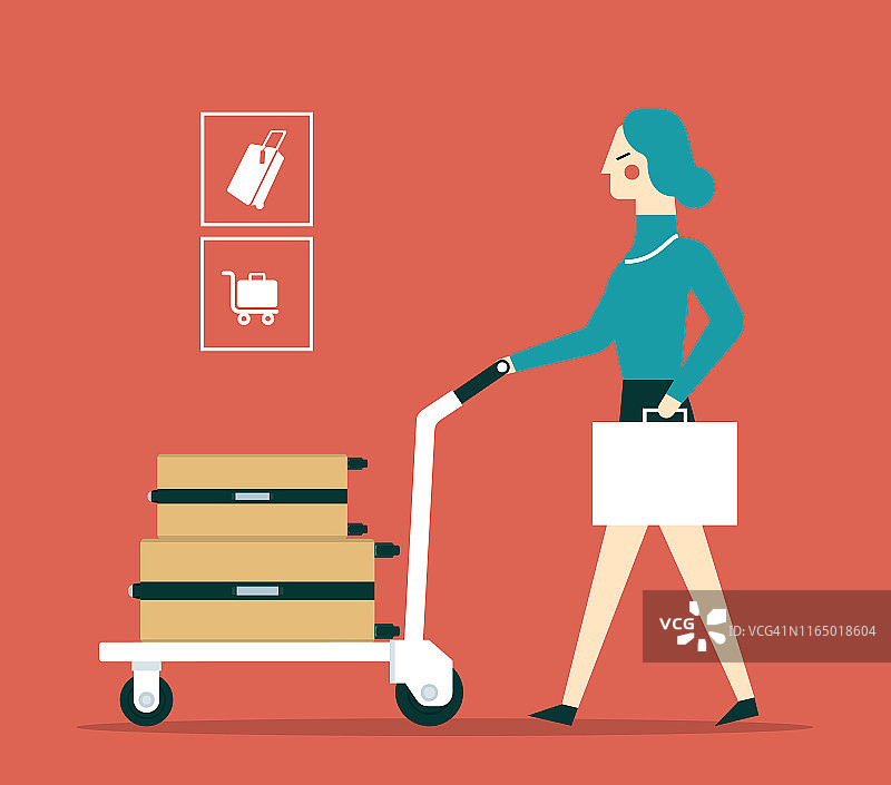 在机场使用行李推车的女商人图片素材