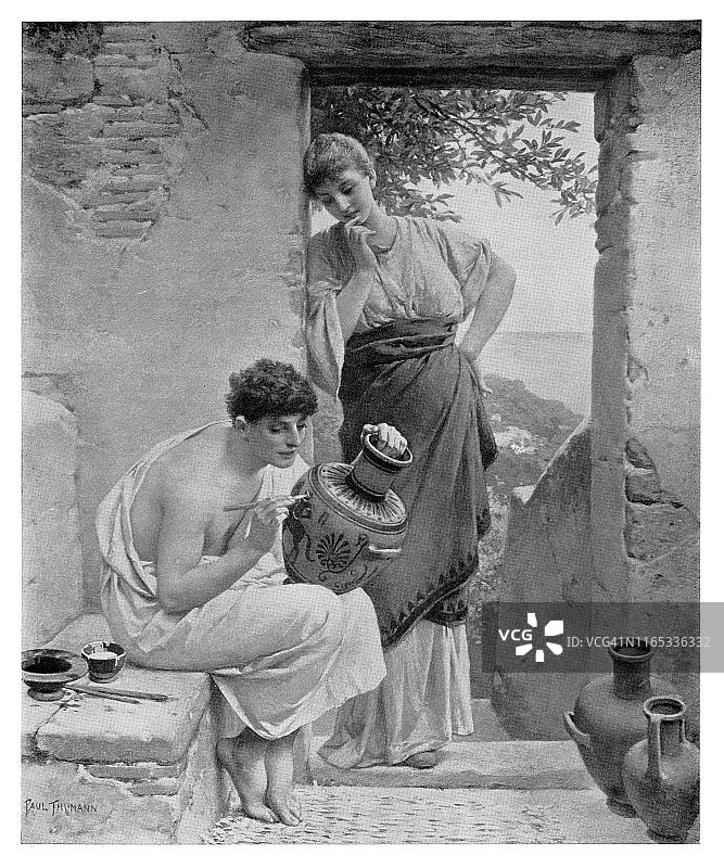 女人欣赏工作中的艺术家图片素材