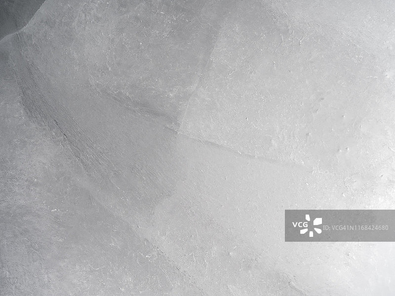 布满裂纹的冰块纹理特写图片素材