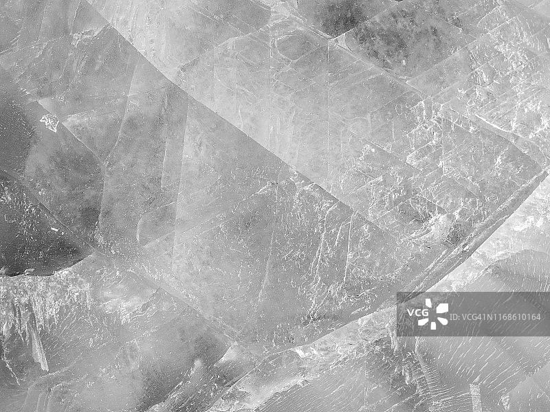 布满裂纹的冰块纹理特写图片素材