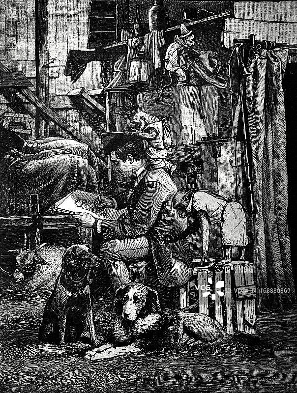 艺术家在狗和猴子的环绕下画肖像图片素材