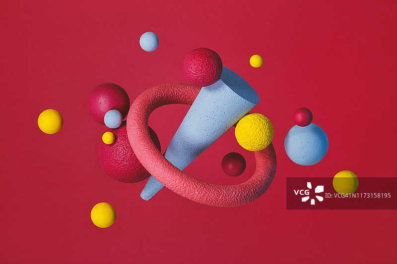 红色背景上的抽象多色物体图片素材