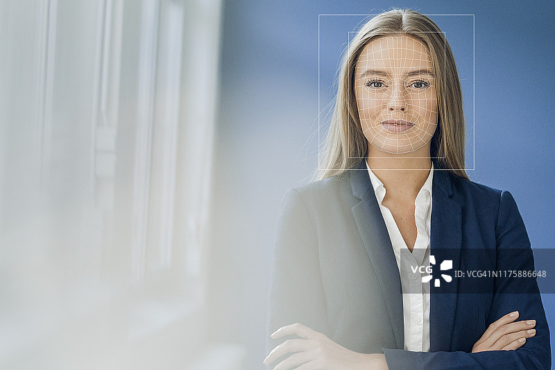 面部识别，面部网格的女商人图片素材
