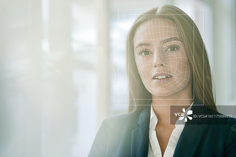面部识别，面部网格的女商人图片素材