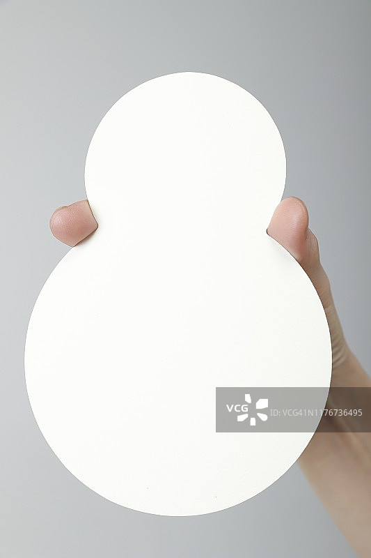 手持白色空白雪人图片素材