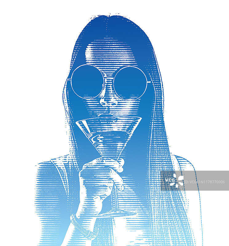 饮用马提尼的美丽年轻女人图片素材