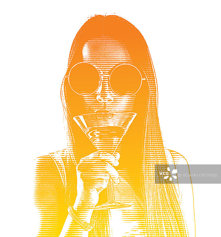 饮用马提尼的美丽年轻女人图片素材