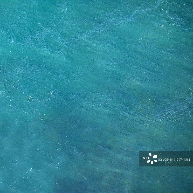 澳大利亚绿松石蓝色海水波浪图案图片素材