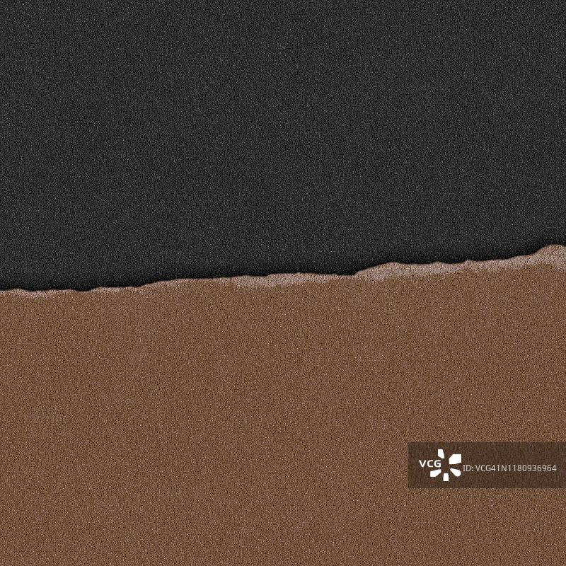 黑色背景上的牛皮纸撕裂效果图片素材