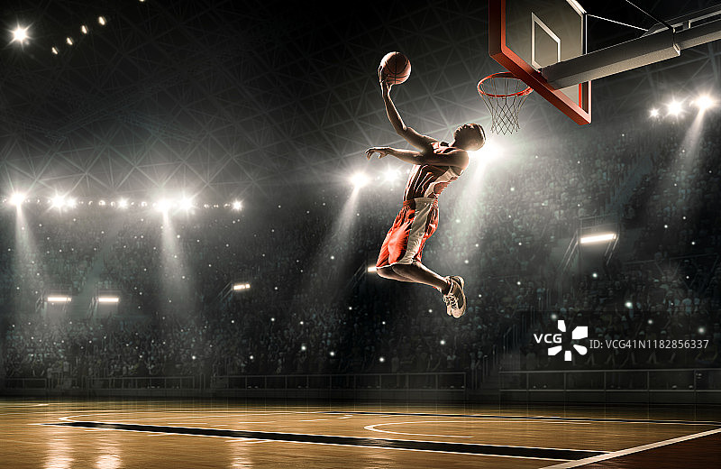 篮球运动员完成扣篮图片素材