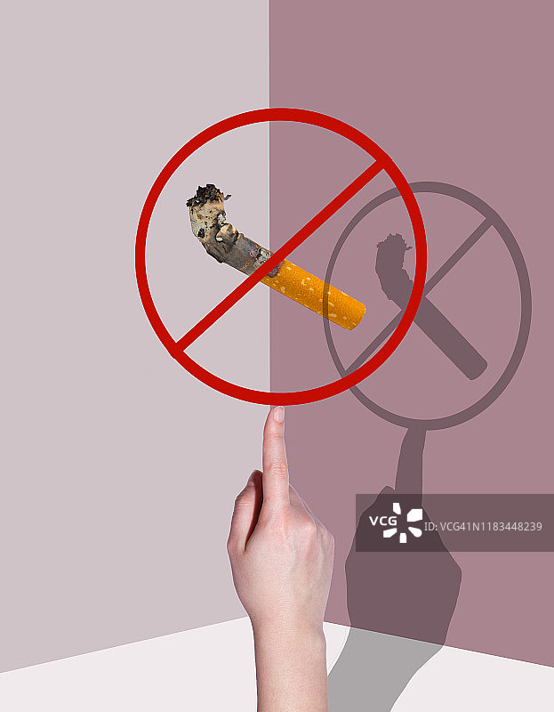 手持带阴影的香烟图片素材