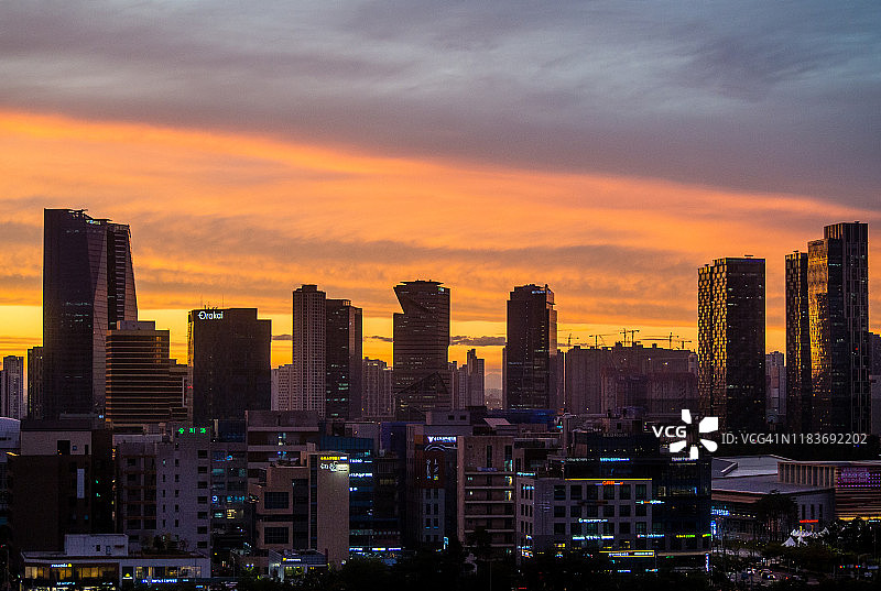 韩国仁川松岛的日落城市景观图片素材
