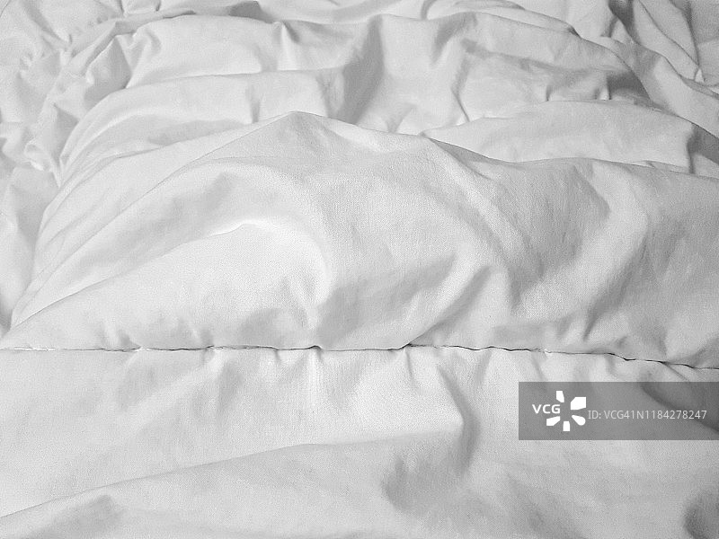 冬季白色羽绒被背景图片素材
