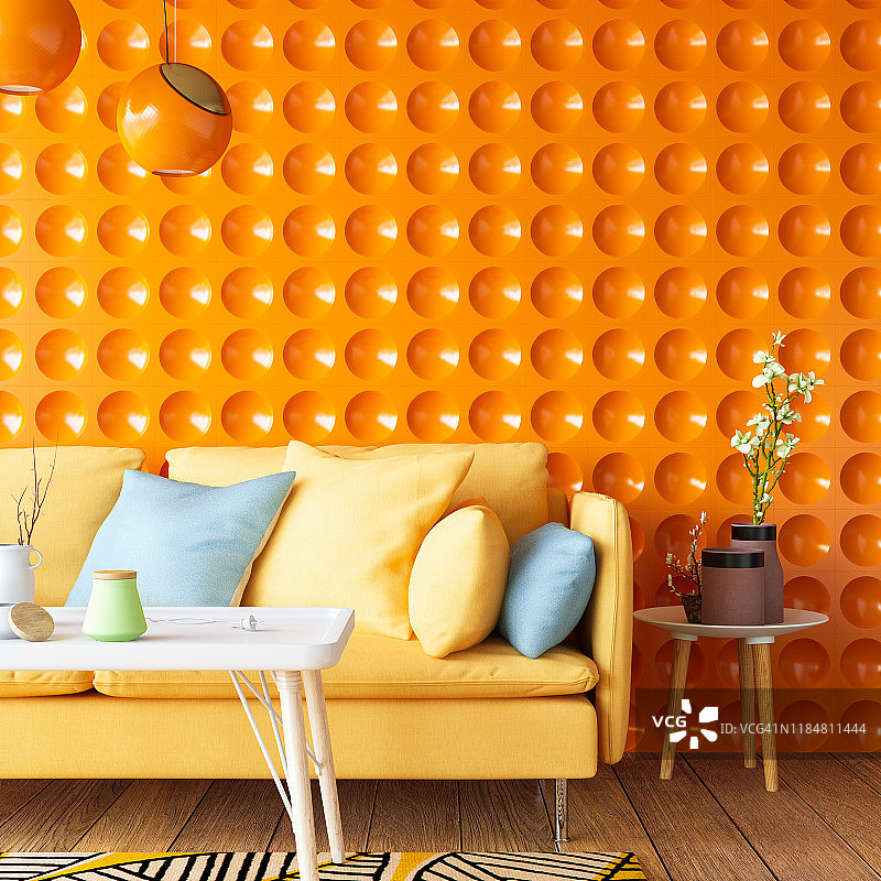 带有橙色几何墙的彩色沙发图片素材