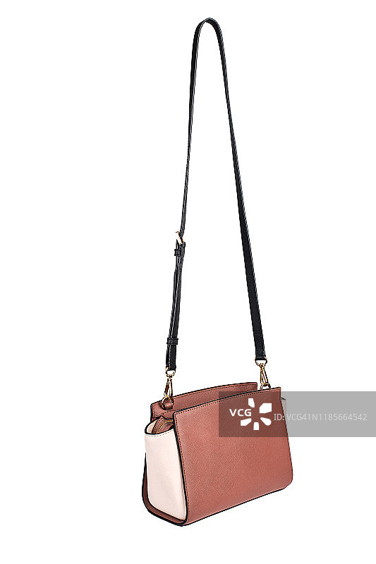 白色背景上的棕色女士皮包图片素材