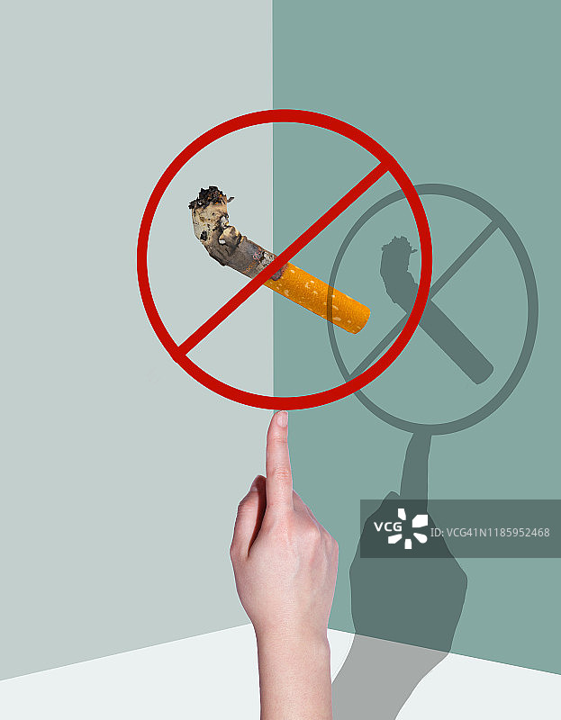 手持带阴影的香烟图片素材