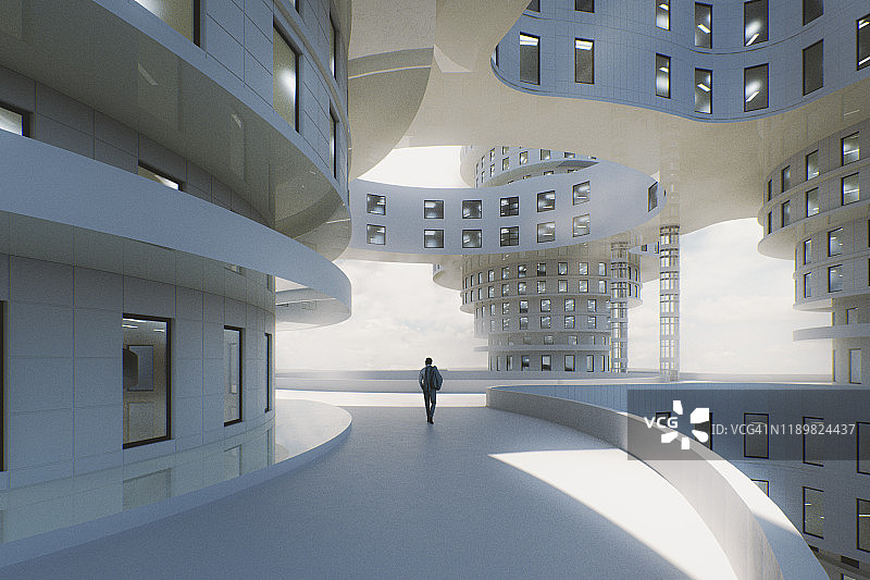 男人走在未来感的办公园区图片素材