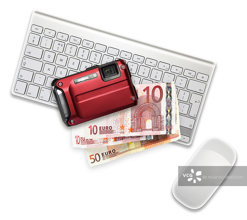 卡片相机和欧元在电脑键盘上图片素材