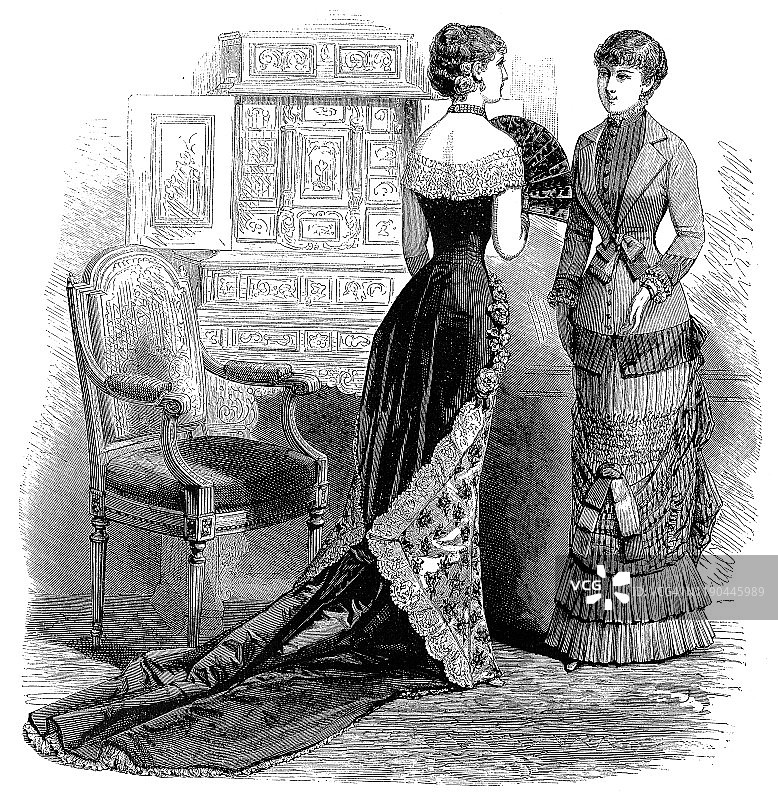 维多利亚时尚女人在客厅图片素材