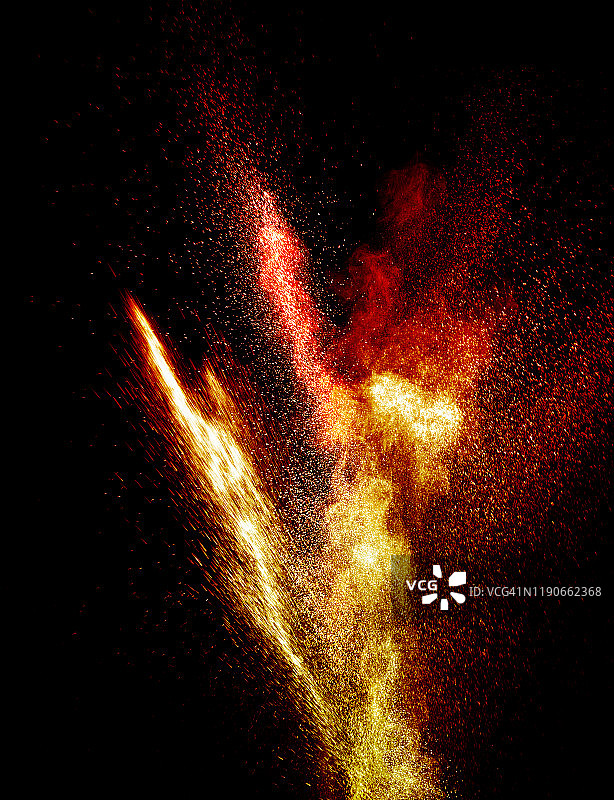 红色和黄色粉末颗粒云在黑色背景上的撞击爆炸图片素材