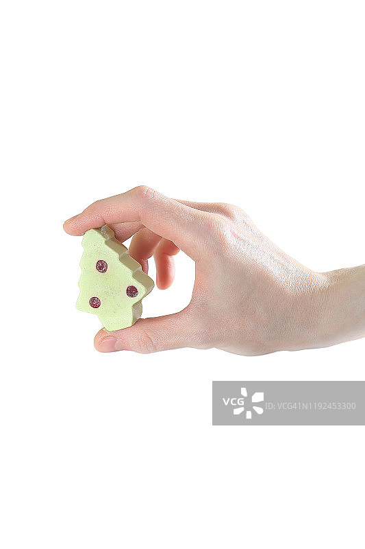 女性手中的圣诞树图片素材