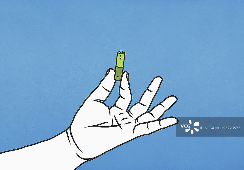 手持绿色电池图片素材