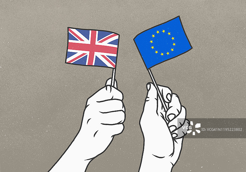 挥舞英国和欧盟小旗帜的手图片素材