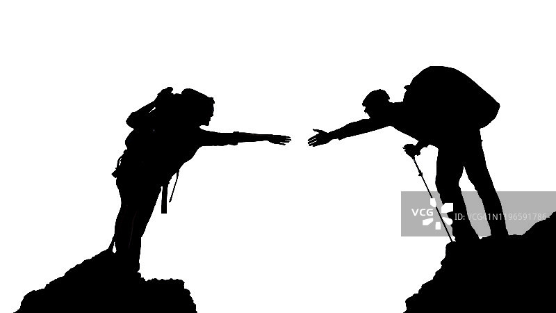 情侣伸出手帮助朋友的剪影，团队合作概念图片素材
