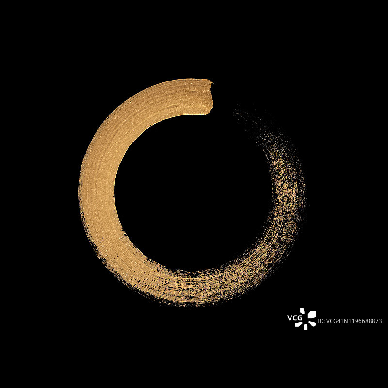 黑色背景上的金色水墨圆圈图片素材