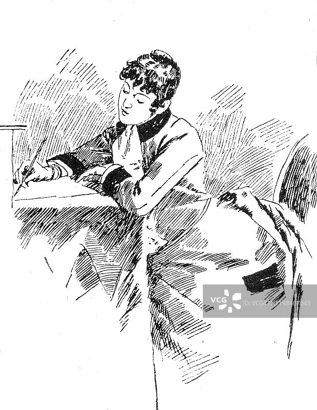 女人在办公桌上用纸写信图片素材