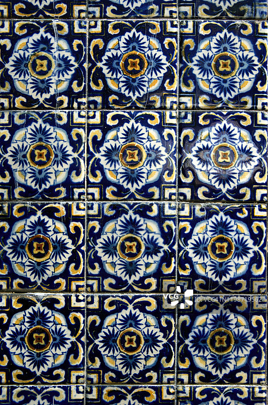 墨西哥科约acan老住宅外墙上的手绘装饰釉面砖图片素材