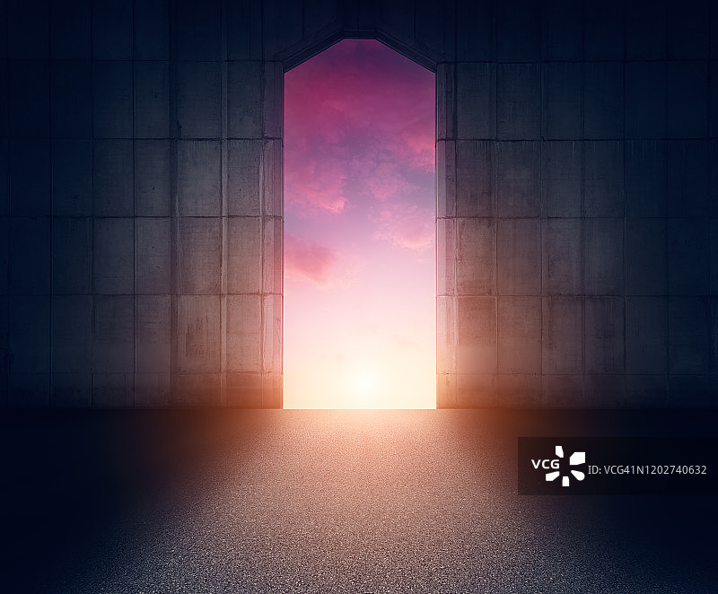 日落背景光线下的混凝土墙门图片素材