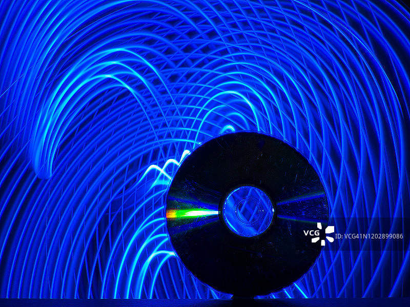 现代环境中圆形蓝色线条构成的DVD图片素材