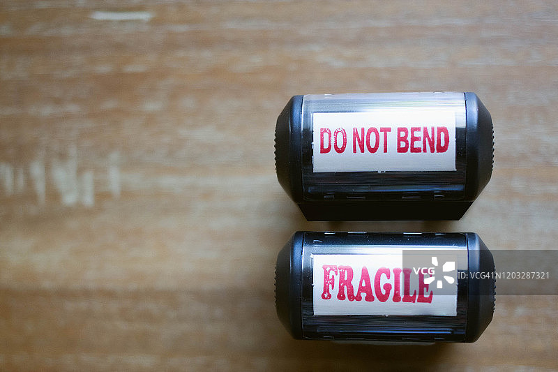 “请勿弯折”和“易碎”印章图片素材