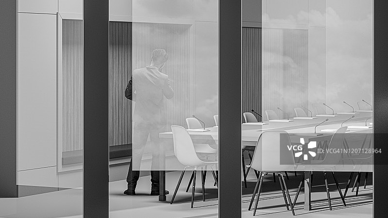 在现代会议室里打电话的商人图片素材