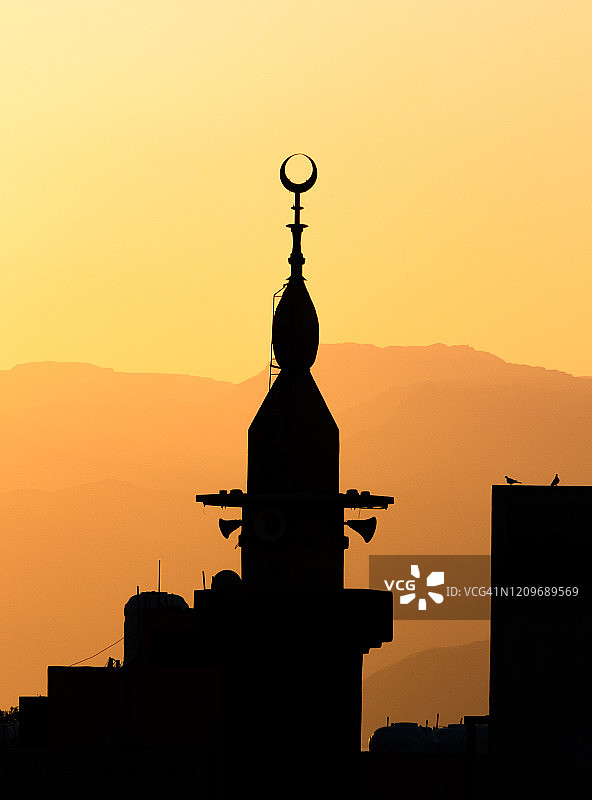 约旦亚喀巴的宣礼塔和日落图片素材
