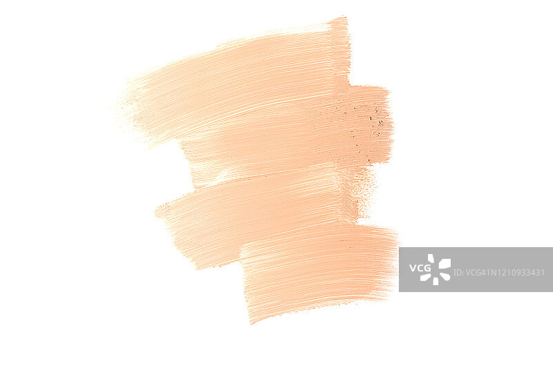 白色背景上的青铜色化妆品涂抹：粉底液化妆品纹理图片素材