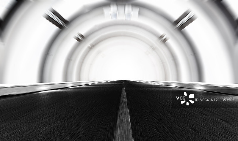 太空漫游隧道中动态模糊的空旷高速公路图片素材