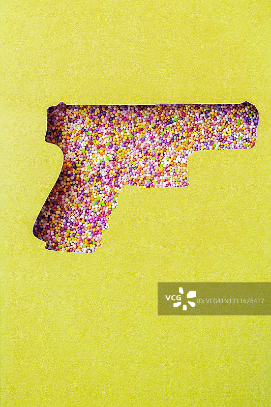 枪形彩色糖屑图片素材